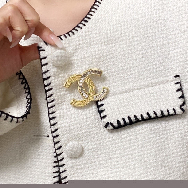 Ch*el brooches